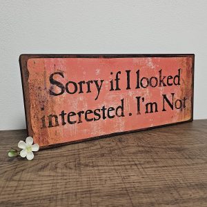 oblong shape tin metal sentiment sign orange/red colour with distressed finish Sorry if I Looked Interested. I'm Not